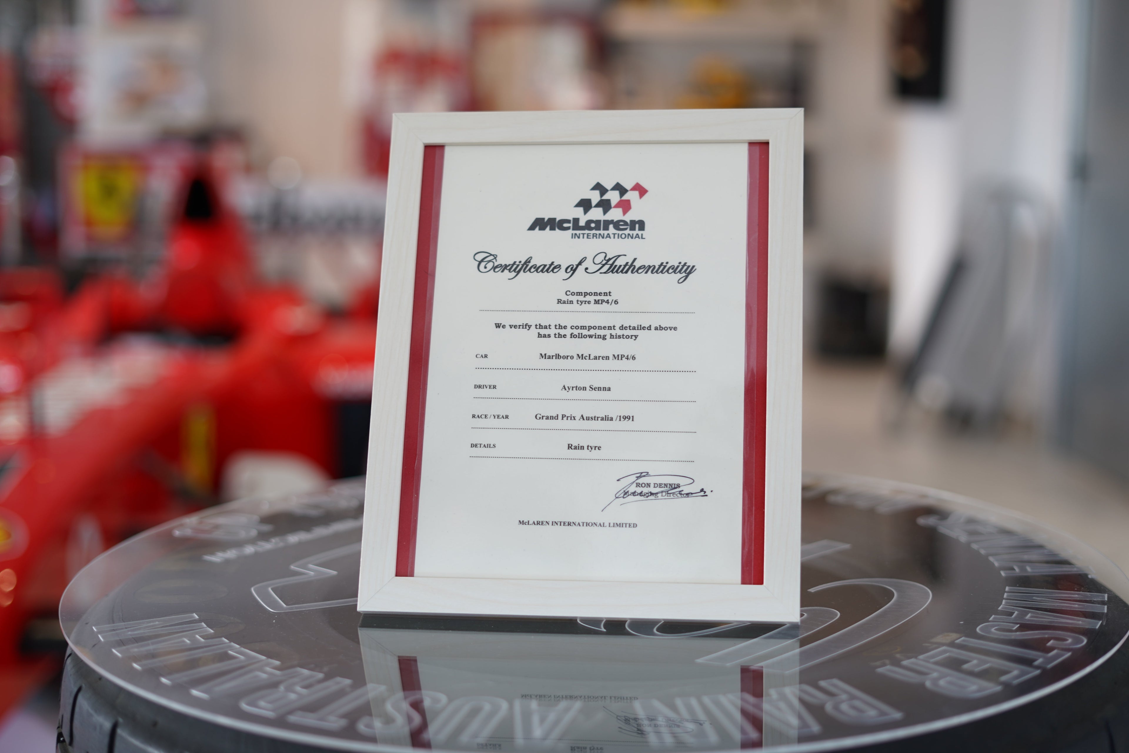 1991 Ayrton Senna MP4/6 front tire table signed